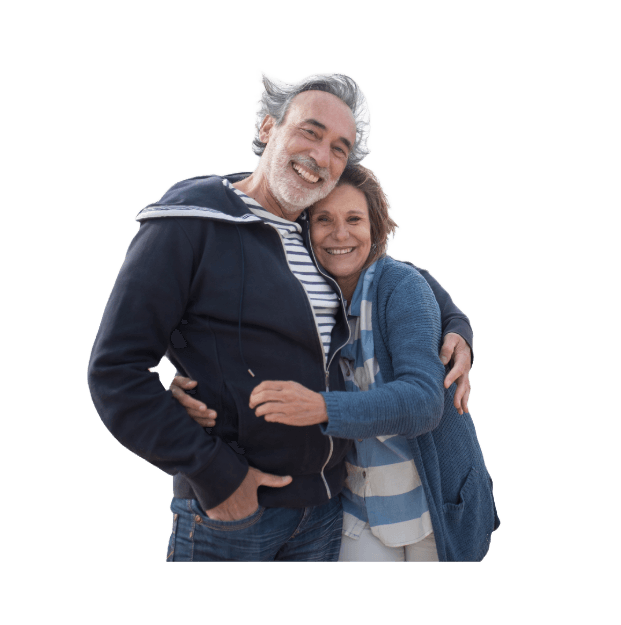 Older couple embracing with healthcare professional